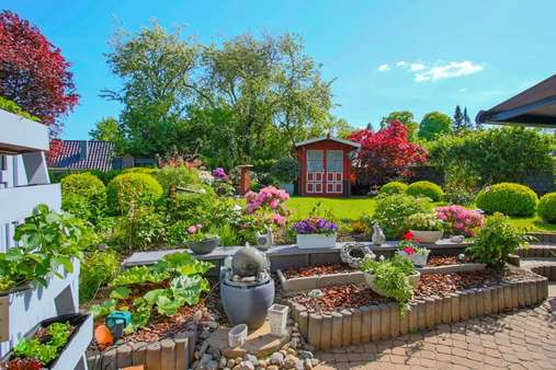 Blick in den Garten - Reihenmittelhaus in 24837 Schleswig mit 113m² kaufen
