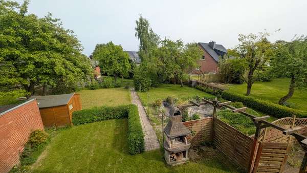 Blick in den Garten Blick in den Garten - Einfamilienhaus in 24996 Sterup mit 94m² kaufen