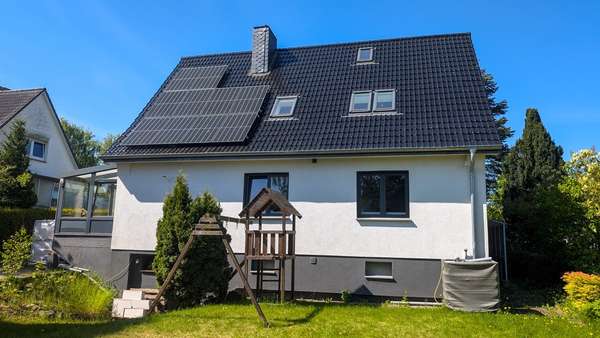 Gartenansicht - Einfamilienhaus in 24392 Süderbrarup mit 101m² kaufen