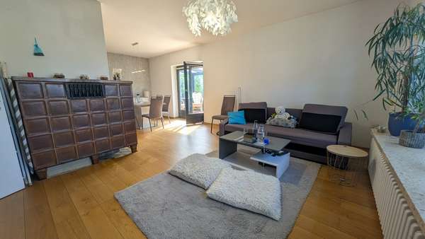 Wohnbereich mit Kachelofen - Einfamilienhaus in 24392 Süderbrarup mit 101m² kaufen