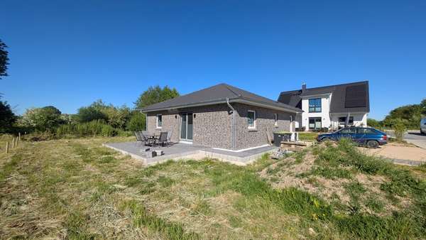 Rückansicht - Bungalow in 24392 Süderbrarup mit 90m² kaufen