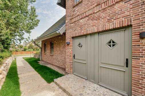 Hausansicht Hausansicht - Doppelhaushälfte in 25980 Sylt mit 190m² kaufen