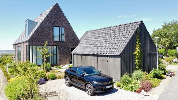 Straßenenansicht Straßenenansicht - Einfamilienhaus in 25813 Husum mit 147m² kaufen