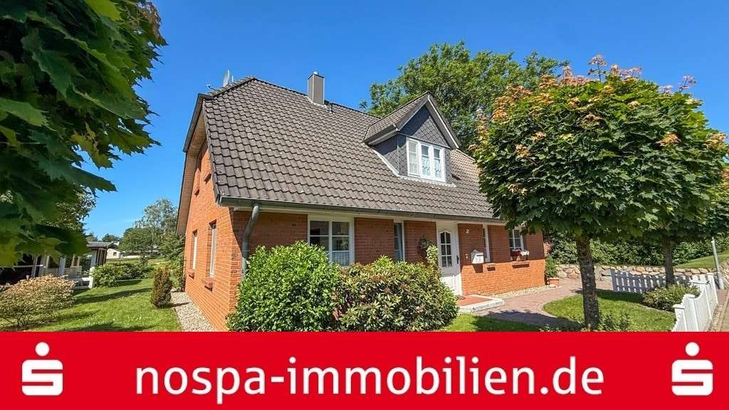 Straßenansicht - Einfamilienhaus in 24980 Meyn mit 136m² kaufen