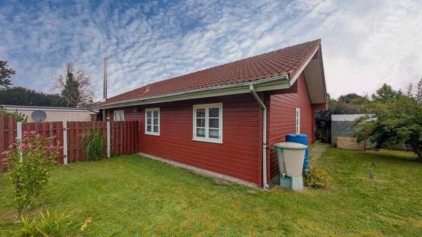 Außenansicht vom Garten Außenansicht vom Garten - Einfamilienhaus in 24376 Grödersby mit 90m² kaufen