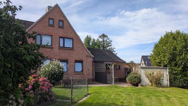 Ansicht vom Garten Ansicht vom Garten - Doppelhaushälfte in 24376 Kappeln mit 82m² kaufen