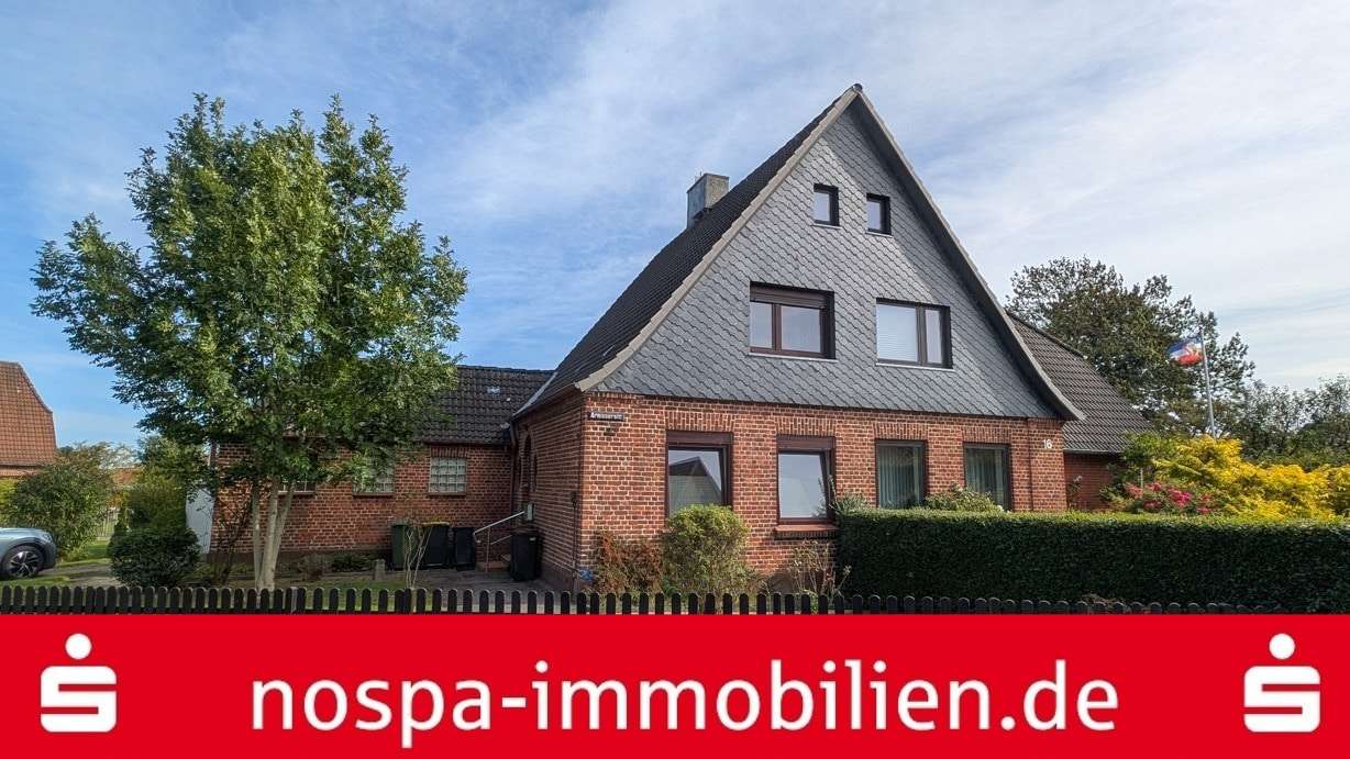 Blick auf das Haus von der Straße Blick auf das Haus von der Straße - Doppelhaushälfte in 24376 Kappeln mit 82m² kaufen