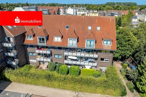 Vermietete 2 Zimmer Eigentumswohnung im Erdgeschoss mit Terrasse, Grundstückanteil und Tiefgaragenstellplatz