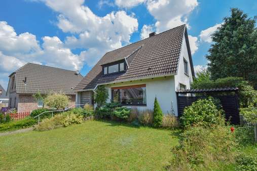 Seitenansicht. - Einfamilienhaus in 25488 Holm mit 132m² kaufen