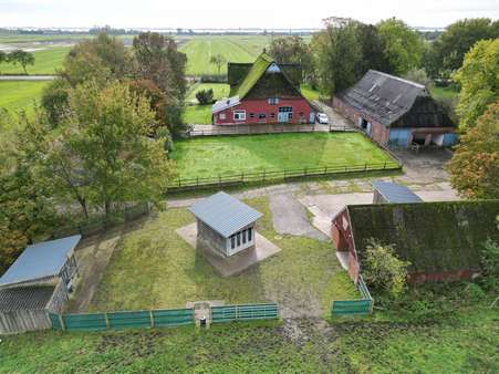 Luftbild Rückseite - Resthof in 25599 Wewelsfleth mit 402m² kaufen