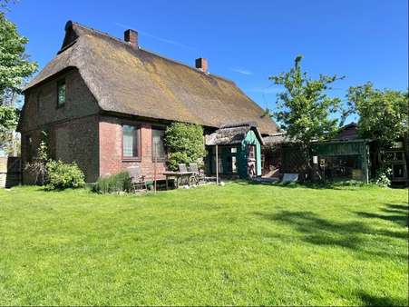Rückseite Rückseite - Einfamilienhaus in 25554 Dammfleth mit 130m² kaufen