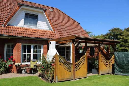 überdachte Terrasse mit Kamingrill - Einfamilienhaus in 25761 Büsum mit 204m² kaufen