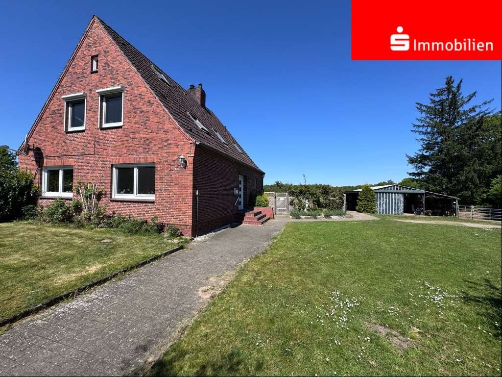 Front-gesamte Ansicht - Einfamilienhaus in 25560 Kaisborstel mit 141m² kaufen