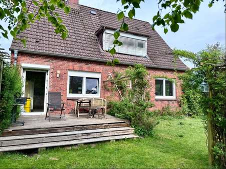 Terrassenseite - Einfamilienhaus in 25560 Kaisborstel mit 141m² kaufen