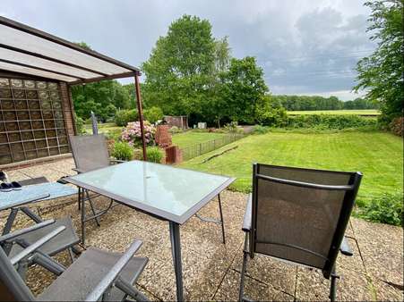 Blick in den Garten - Doppelhaushälfte in 25569 Krempermoor mit 97m² kaufen