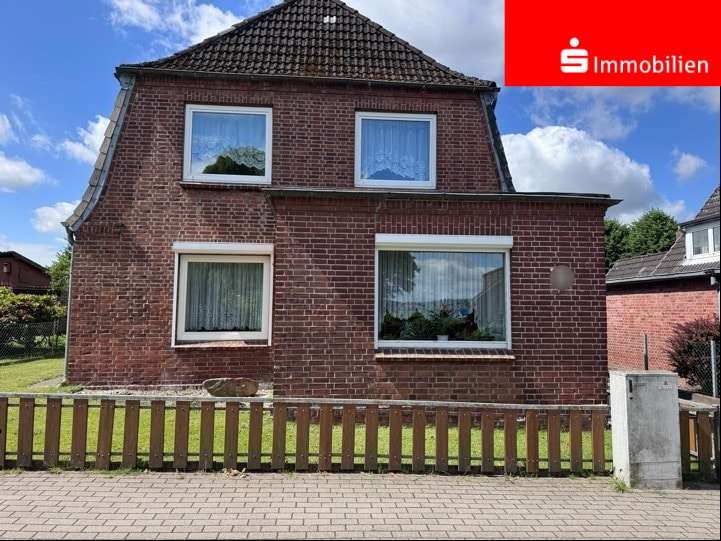 Front Ansicht 1 - Einfamilienhaus in 25587 Münsterdorf mit 148m² kaufen