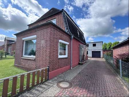 Front Ansicht 2 - Einfamilienhaus in 25587 Münsterdorf mit 148m² kaufen