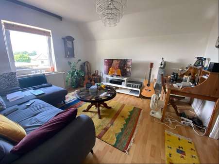 Wohnzimmer - Mehrfamilienhaus in 25348 Blomesche Wildnis mit 216m² kaufen