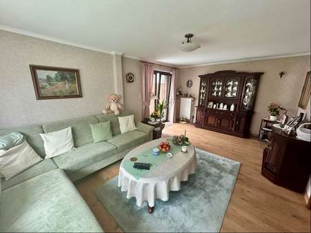 Wohnzimmer mit Terrassenzugang - Einfamilienhaus in 25524 Itzehoe mit 87m² kaufen