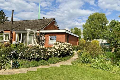 Blick aufs Haus - Einfamilienhaus in 23569 Lübeck mit 74m² kaufen