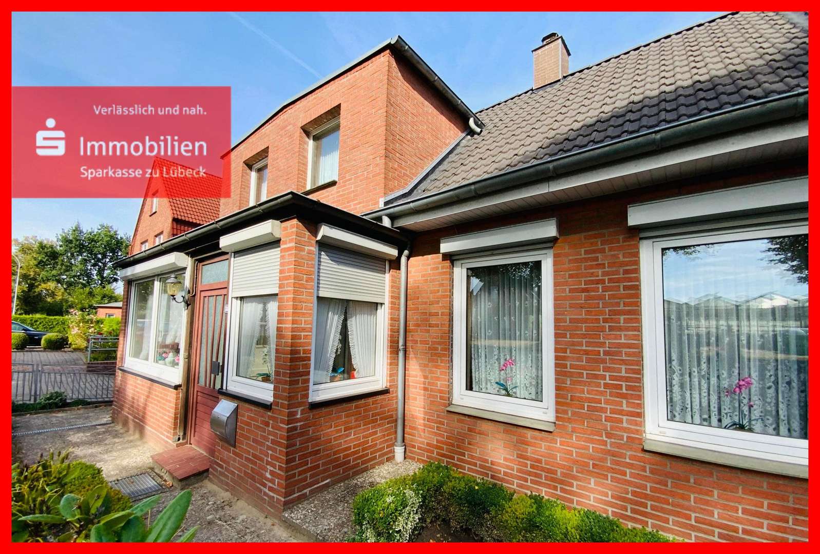 Frontansicht - Doppelhaushälfte in 23558 Lübeck mit 115m² günstig kaufen
