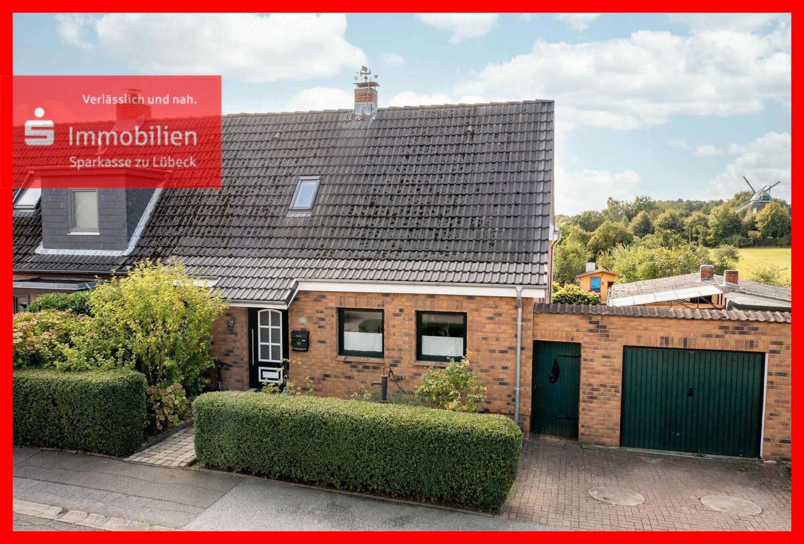 Straßenansicht - Doppelhaushälfte in 23570 Lübeck mit 156m² günstig kaufen