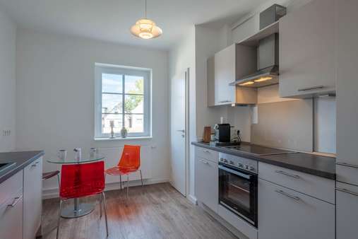 moderne Einbauküche - Etagenwohnung in 23570 Lübeck mit 60m² günstig kaufen