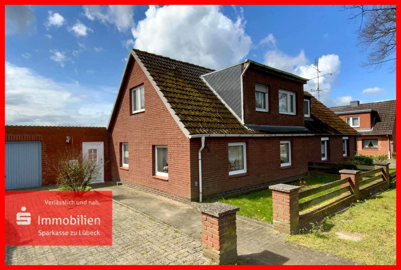 Straßenansicht - Doppelhaushälfte in 23560 Lübeck mit 141m² günstig kaufen