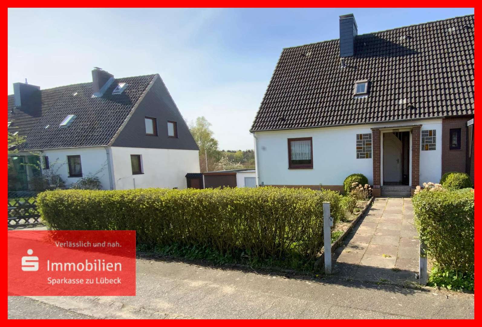 Hausansicht - Doppelhaushälfte in 23570 Lübeck mit 85m² günstig kaufen