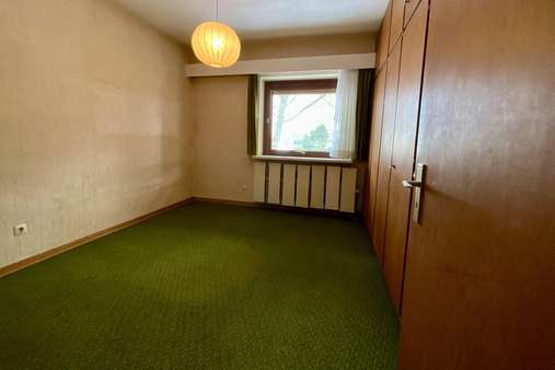 linkes Zimmer straßenseitig im EG - Einfamilienhaus in 23570 Lübeck mit 184m² kaufen