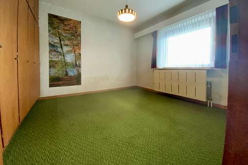 rechtes Zimmer straßenseitig im EG - Einfamilienhaus in 23570 Lübeck mit 184m² kaufen