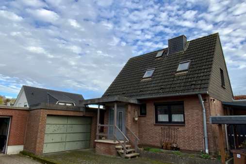Hausansicht - Einfamilienhaus in 23556 Lübeck mit 133m² kaufen