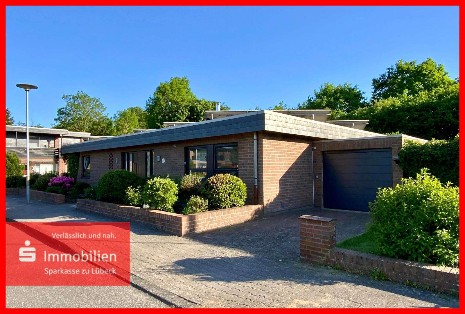 Straßenansicht - Bungalow in 23562 Lübeck mit 134m² kaufen