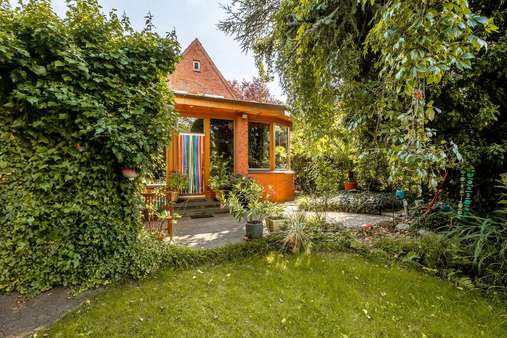 Terrasse und Ansicht vom Garten - Einfamilienhaus in 23568 Lübeck mit 150m² kaufen