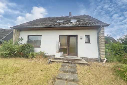 Hausansicht - Einfamilienhaus in 23570 Lübeck mit 115m² kaufen