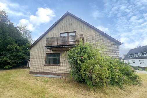 Seitenansicht - Einfamilienhaus in 23570 Lübeck mit 115m² kaufen