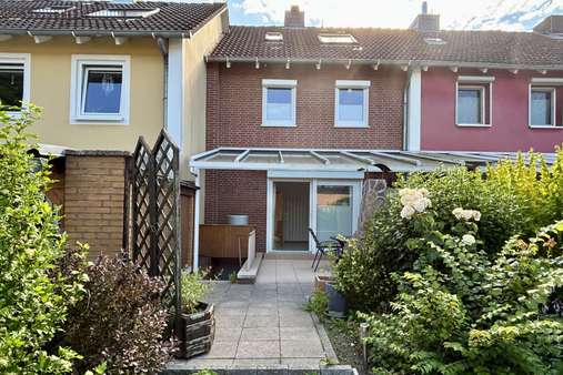 Rückansicht Rückansicht - Reihenmittelhaus in 23569 Lübeck mit 70m² kaufen