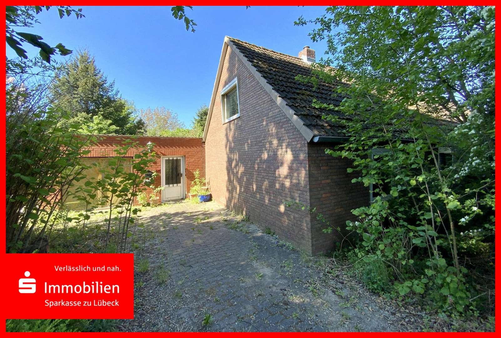 Straßenansicht - Doppelhaushälfte in 23560 Lübeck mit 114m² kaufen