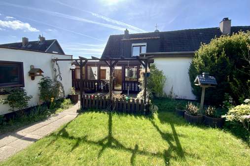 Rückseite - Doppelhaushälfte in 23569 Lübeck mit 109m² kaufen