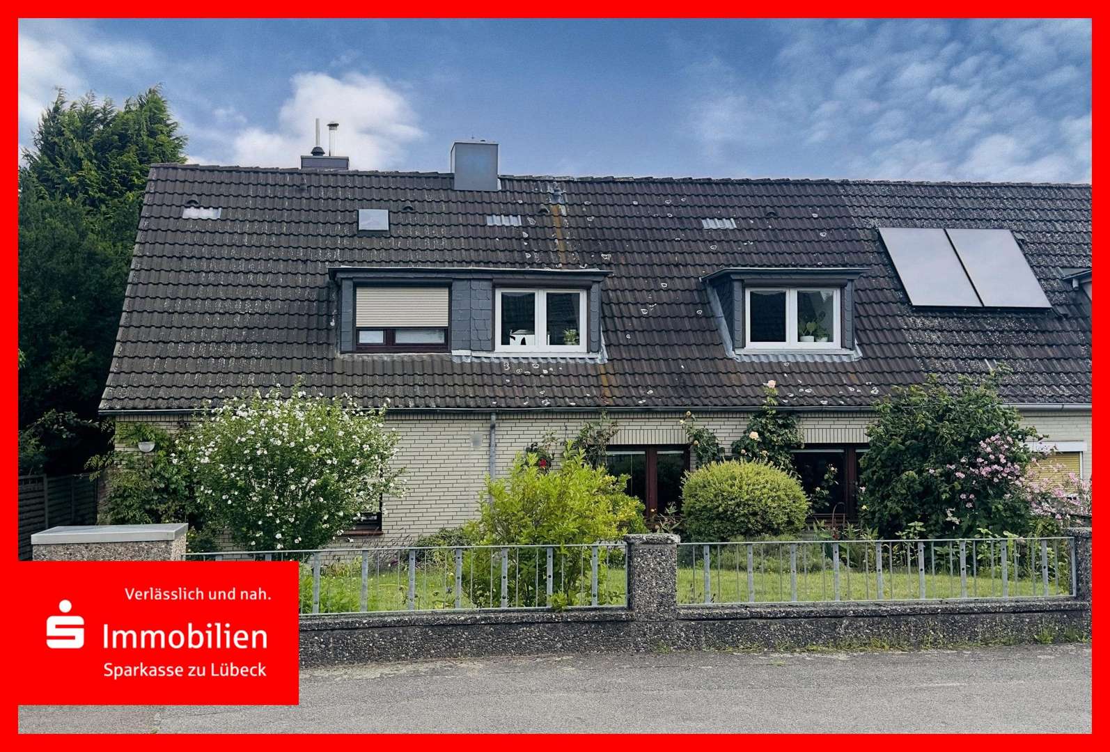Hausansicht - Reihenmittelhaus in 23569 Lübeck mit 100m² kaufen