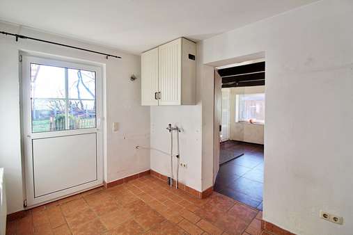 Seitliche Eingangstür - Einfamilienhaus in 24640 Hasenmoor mit 95m² günstig kaufen