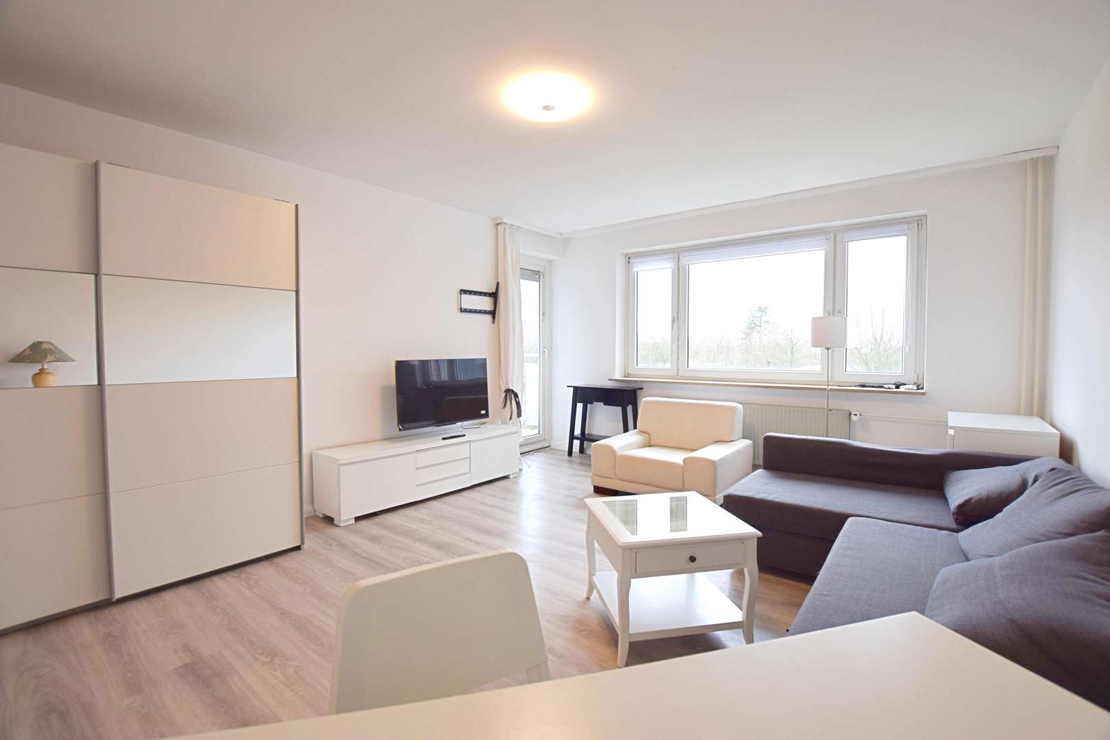 Wohnbereich mit Balkonzugang - Etagenwohnung in 25462 Rellingen mit 71m² kaufen