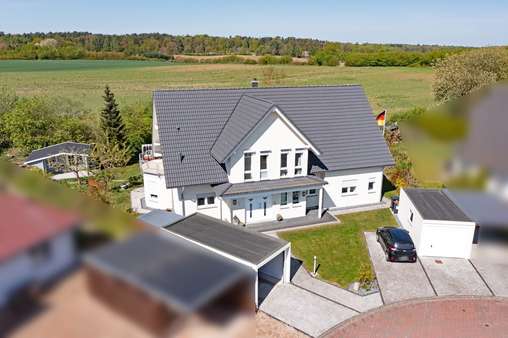 Hausansicht - Zweifamilienhaus in 23911 Mustin mit 285m² kaufen