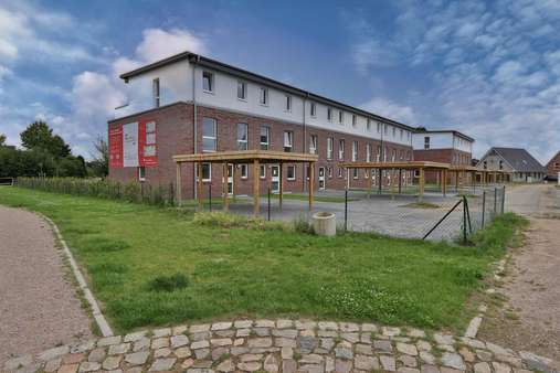 Vordere Gebäudeansicht - Reihenmittelhaus in 21039 Escheburg mit 143m² kaufen