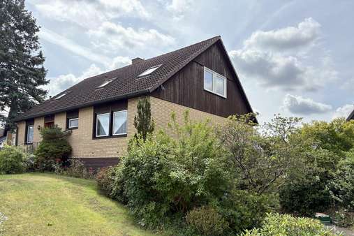 Seitenansicht - Einfamilienhaus in 23879 Mölln mit 185m² kaufen