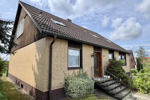 Seitenansicht - Einfamilienhaus in 23879 Mölln mit 185m² kaufen
