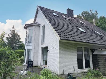 Hausansicht Terrasse - Doppelhaushälfte in 23562 Lübeck mit 90m² kaufen