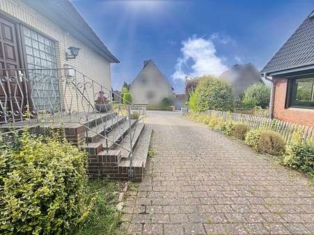 Hauseingang Hauseingang - Einfamilienhaus in 21502 Hamwarde mit 98m² kaufen
