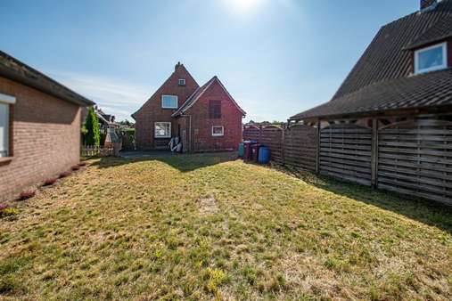 Gartenansicht - Einfamilienhaus in 21365 Adendorf mit 81m² kaufen