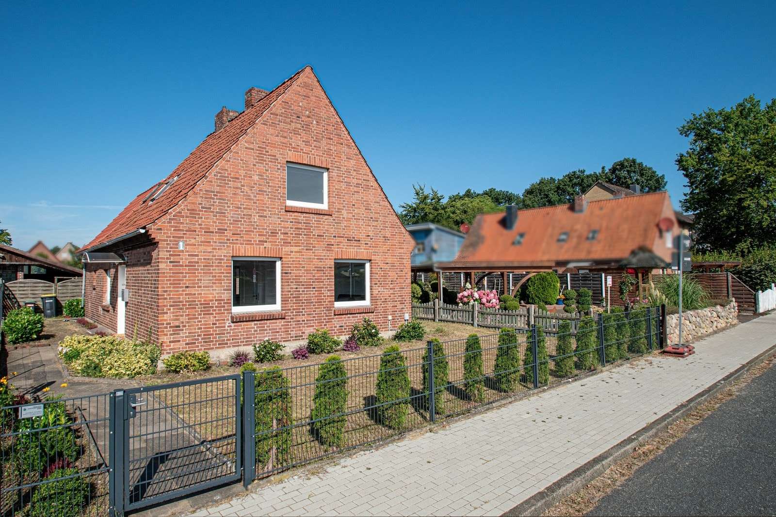 Straßenansicht - Einfamilienhaus in 21365 Adendorf mit 81m² kaufen